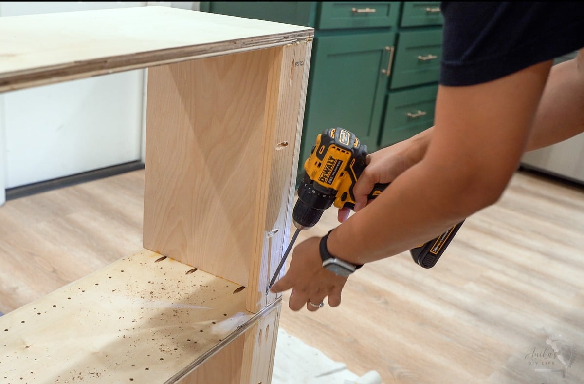 Woman attaching cleats