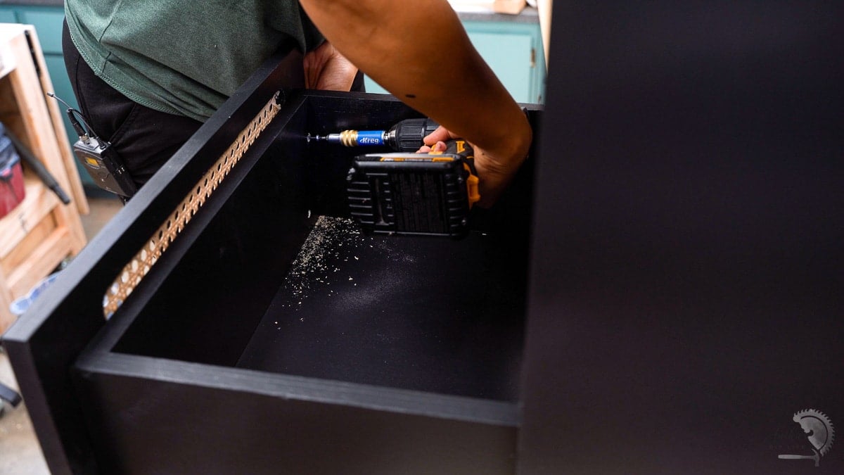 Attaching the drawer front using wood screws
