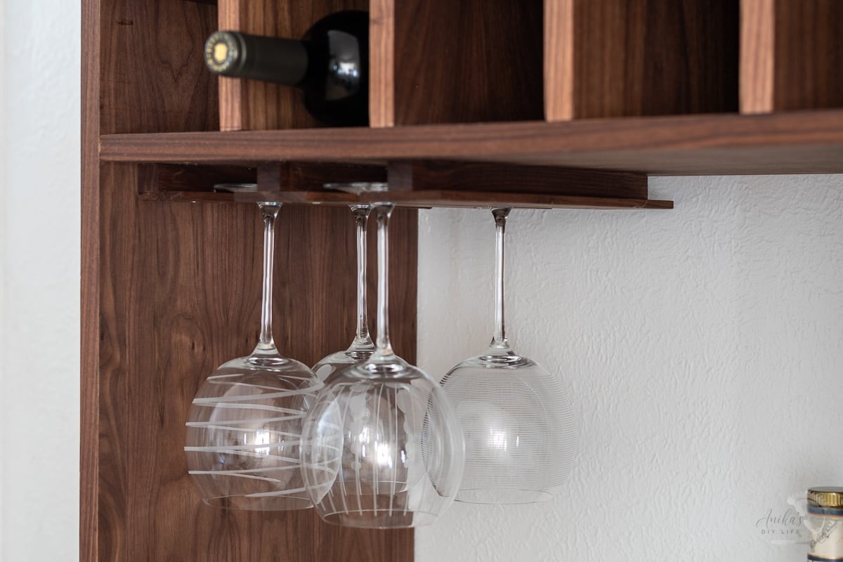 close up of the wine glass holder and wine rack