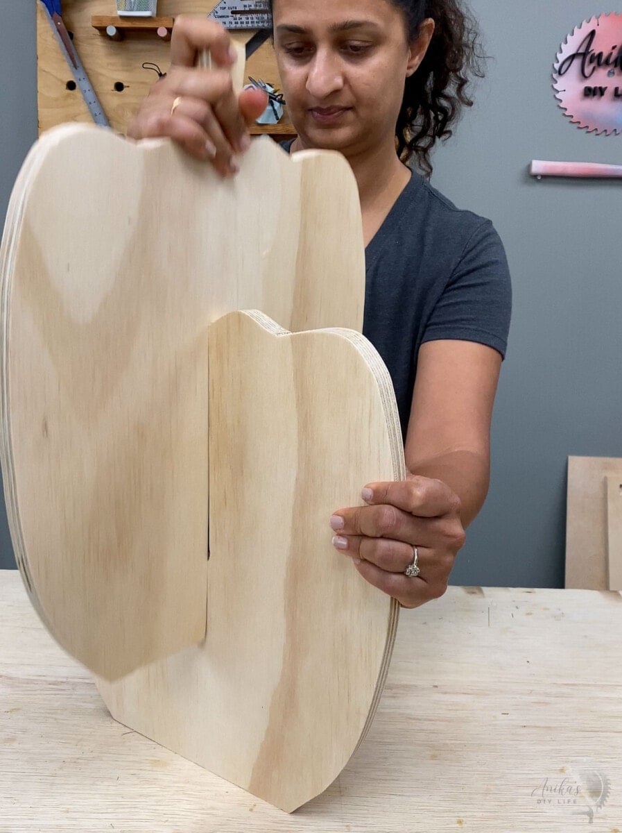 Slide cutouts together to make the plywood pumpkin