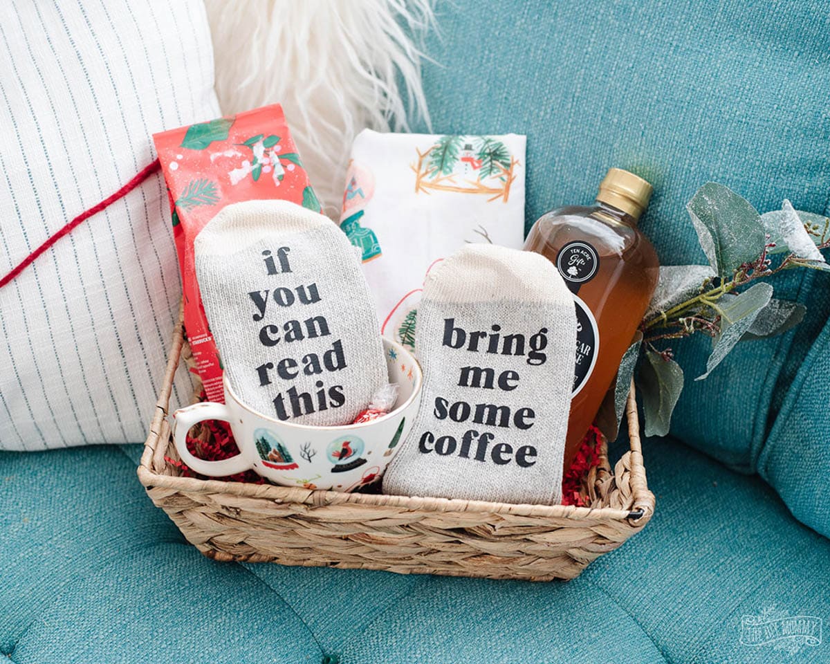 Gift basket with socks that say "if you can read this" on one sock and "bring me some coffee" on the other sock.