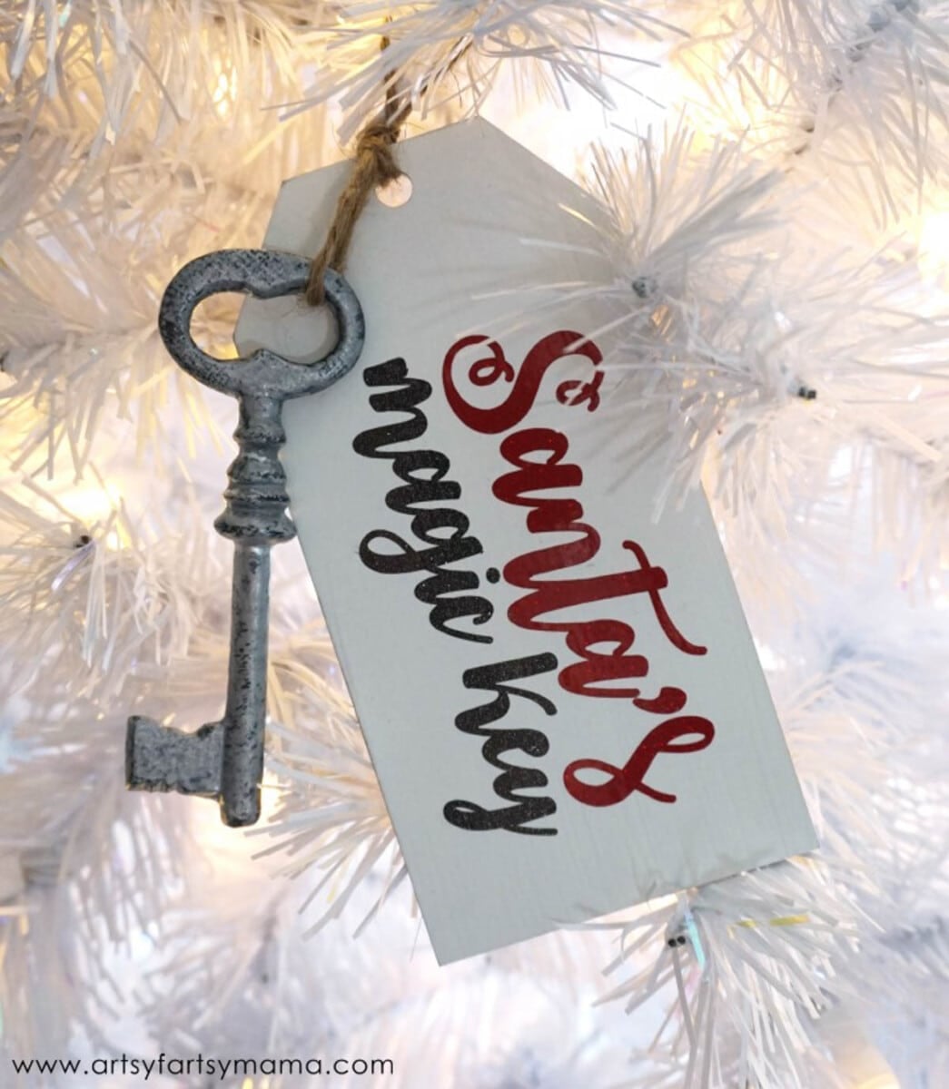 Cricut Christmas ornament in the shape of a gift tag with a key