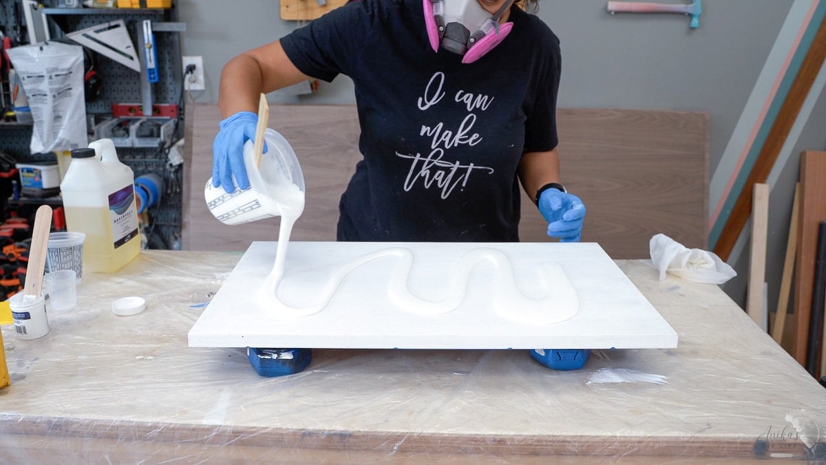 Pouring epoxy onto plywood