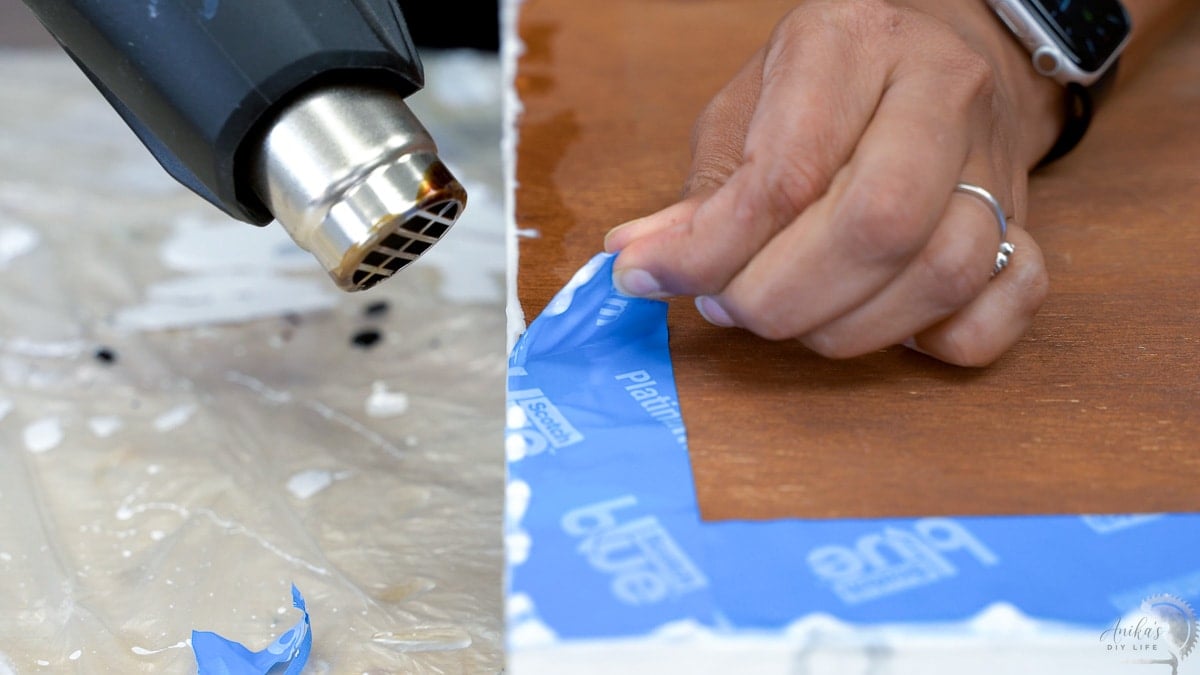 Removing tape from back of plywood board