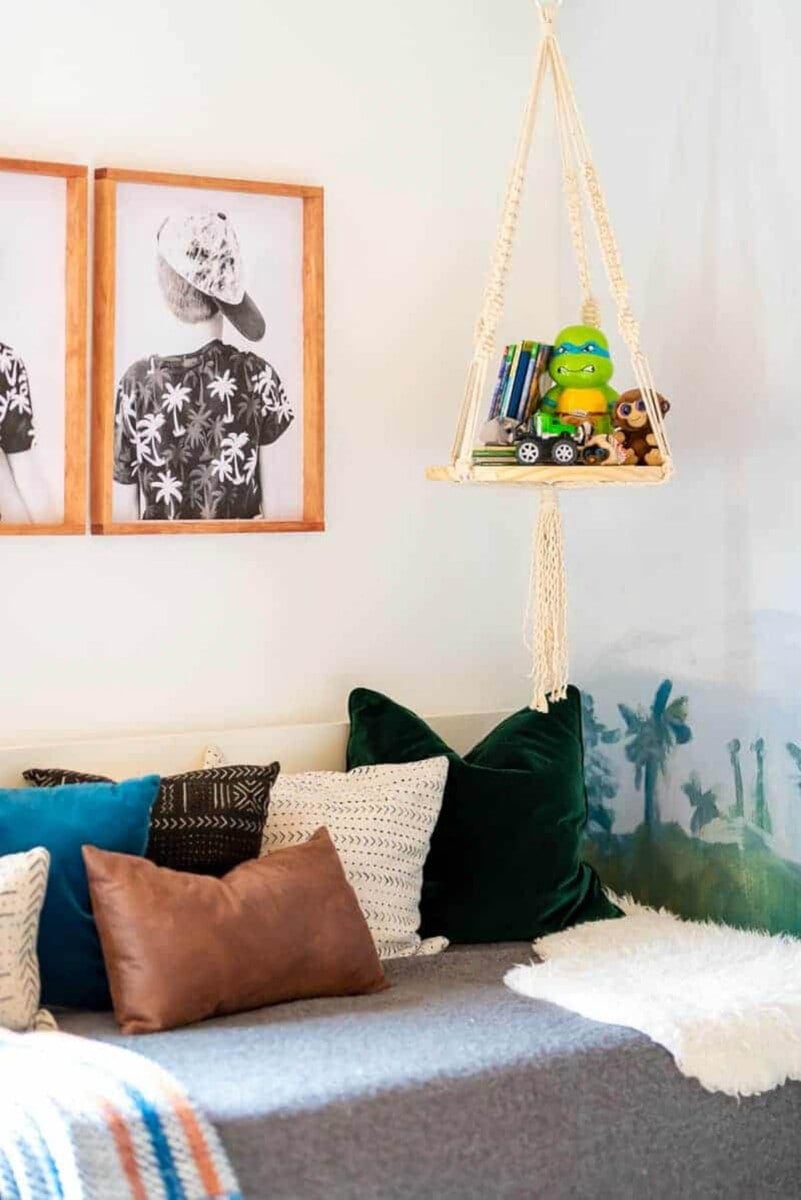 Large DIY picture frames hanging above sofa