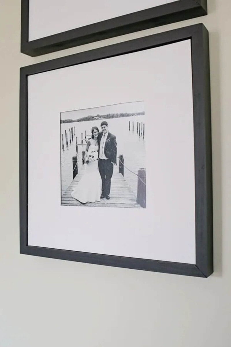 Black picture frame with matted picture