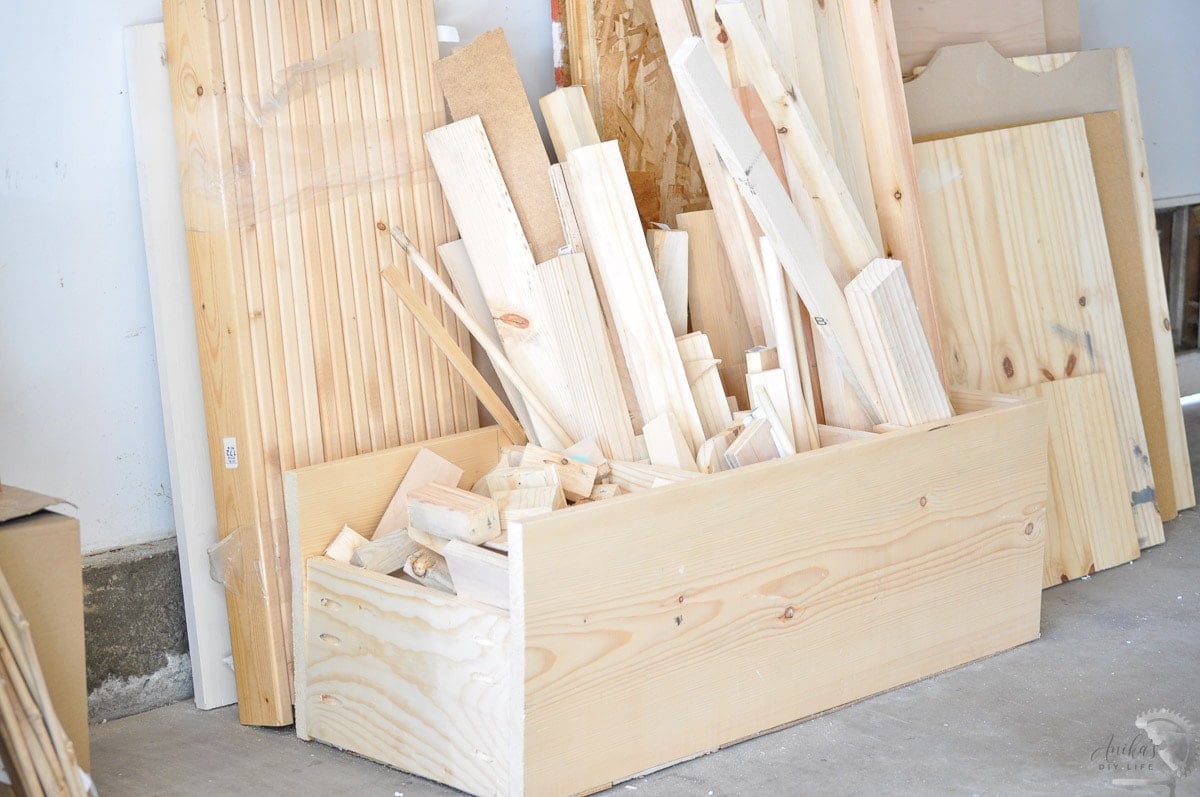 a simple wood bin with scrap wood in a workshop