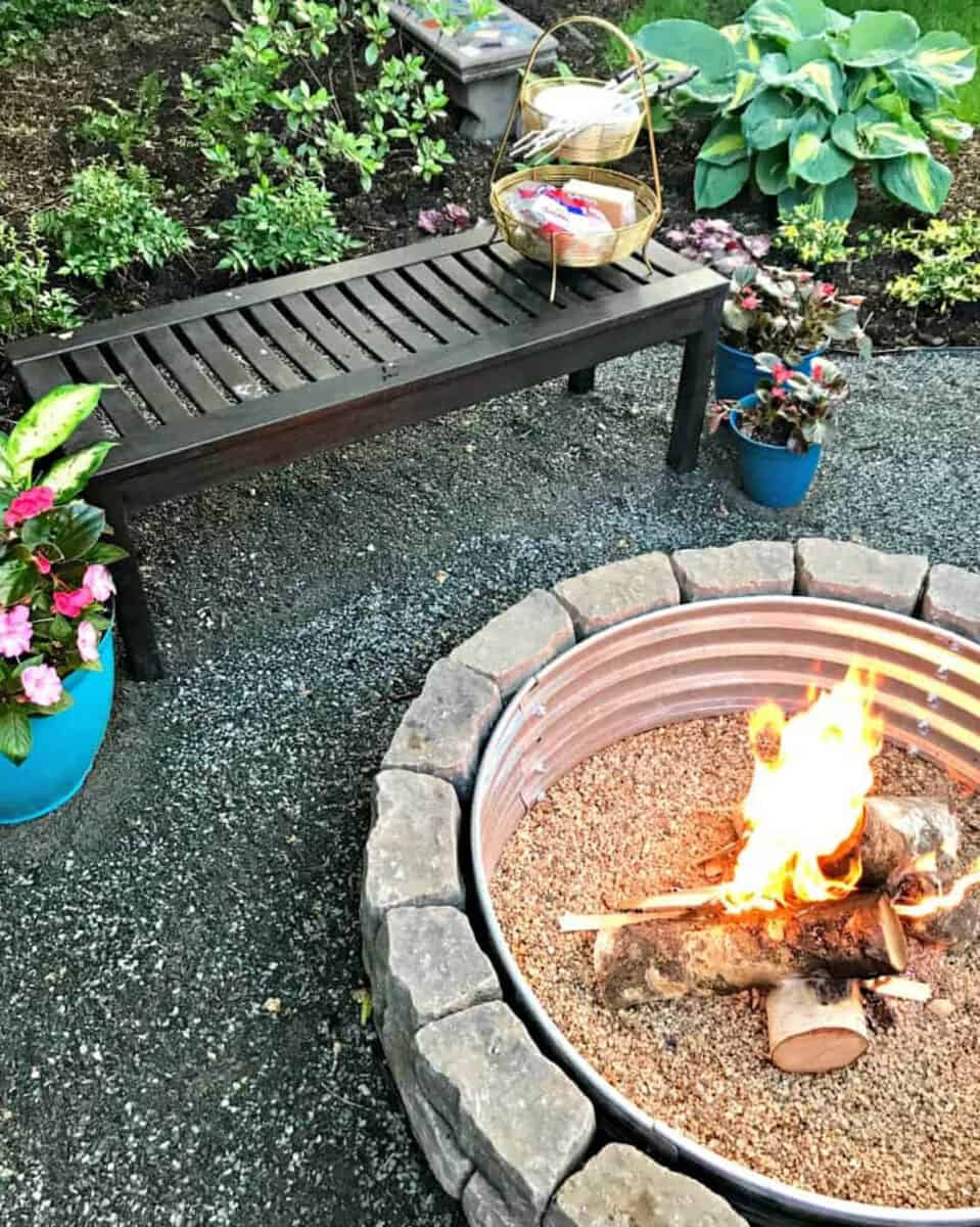 landscape brick DIY fire pit idea with bench seating