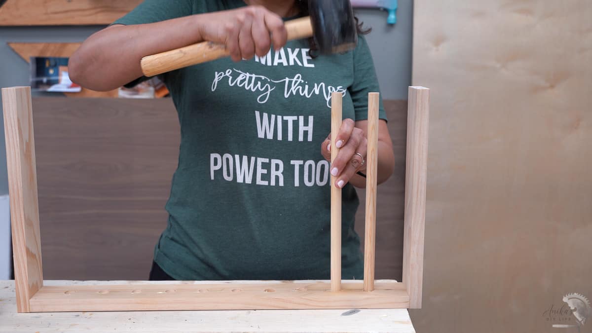 Adding dowels to make the drying rack