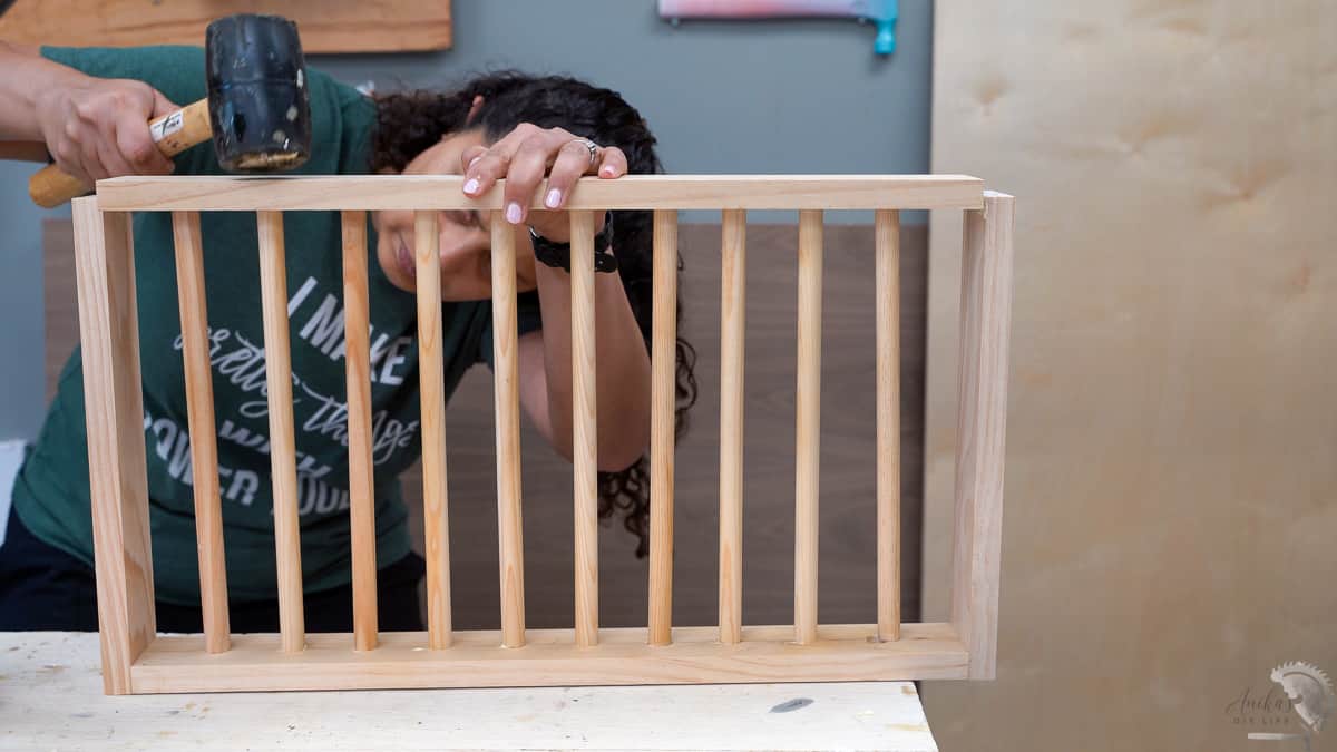 Attaching the sides of the pull out drying rack.