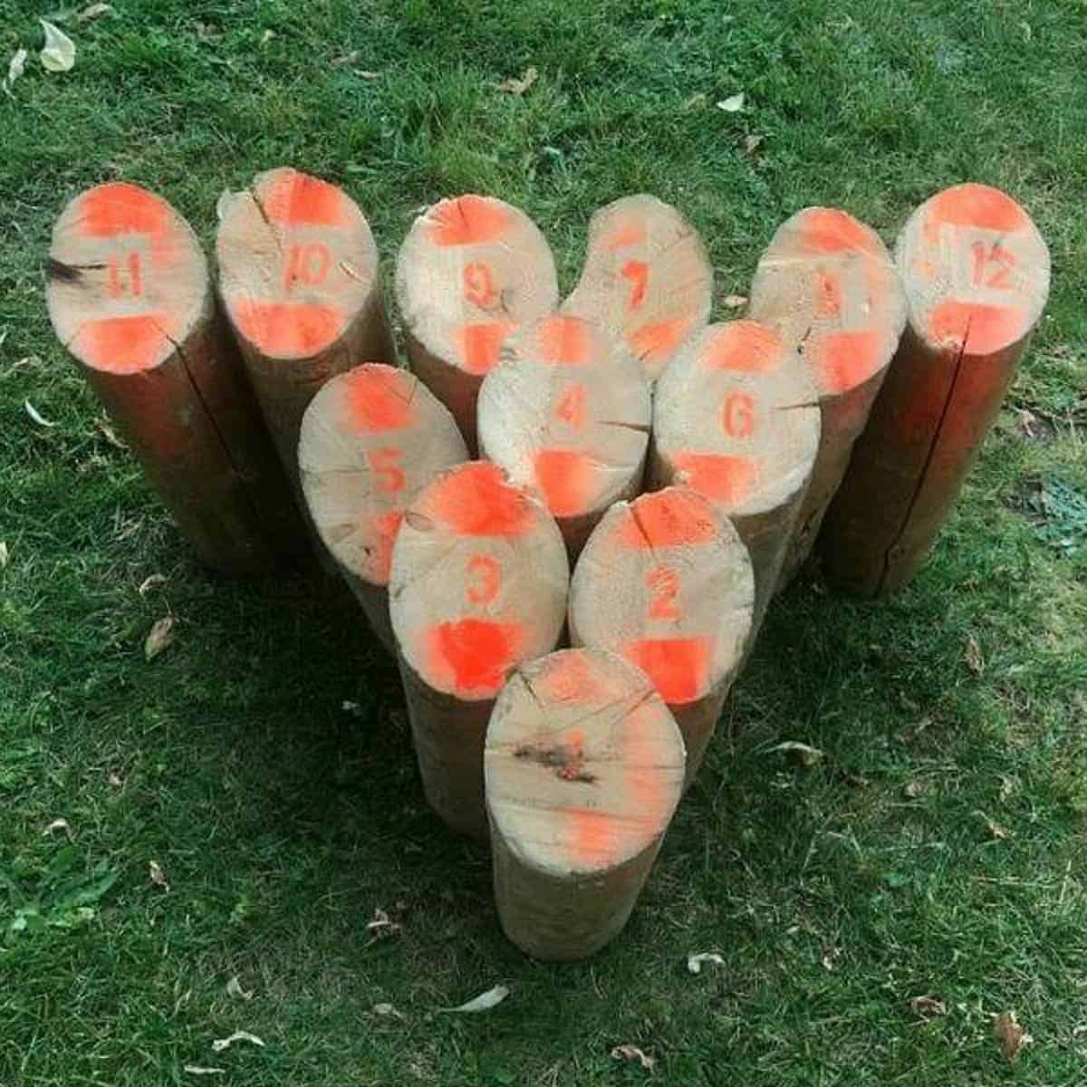 log bowling game pins