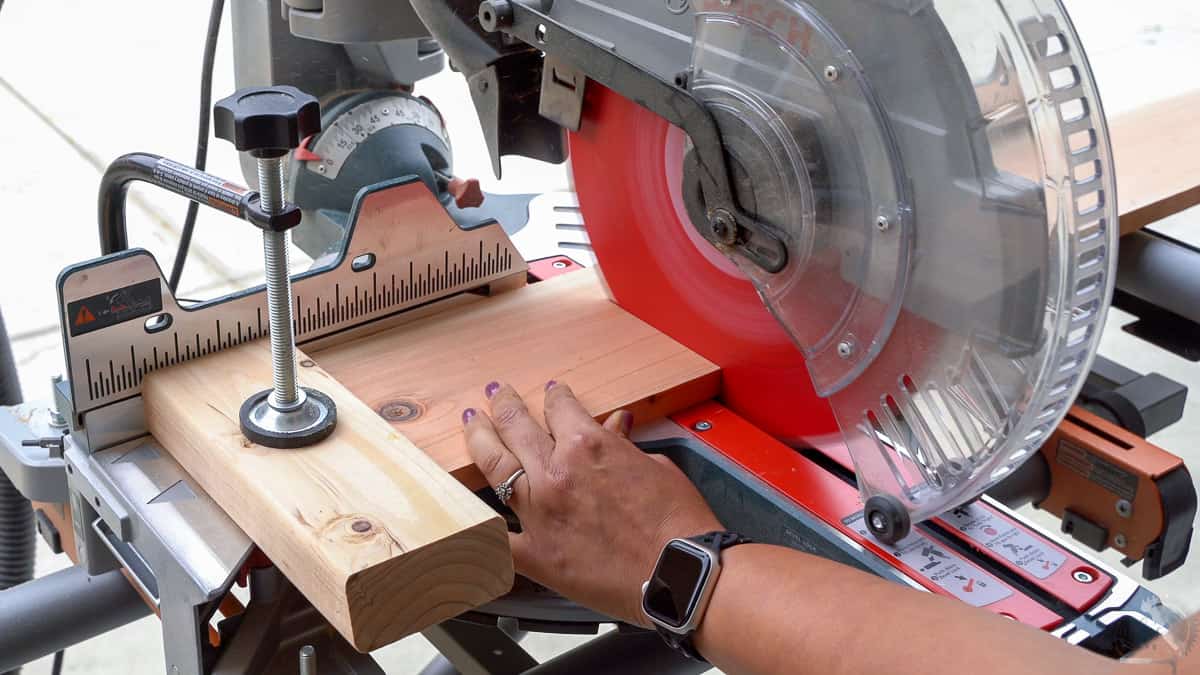 Making repeated cuts on a miter saw using a stop block