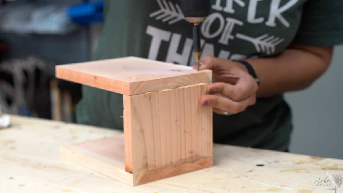 Attaching the boards using trim head screws