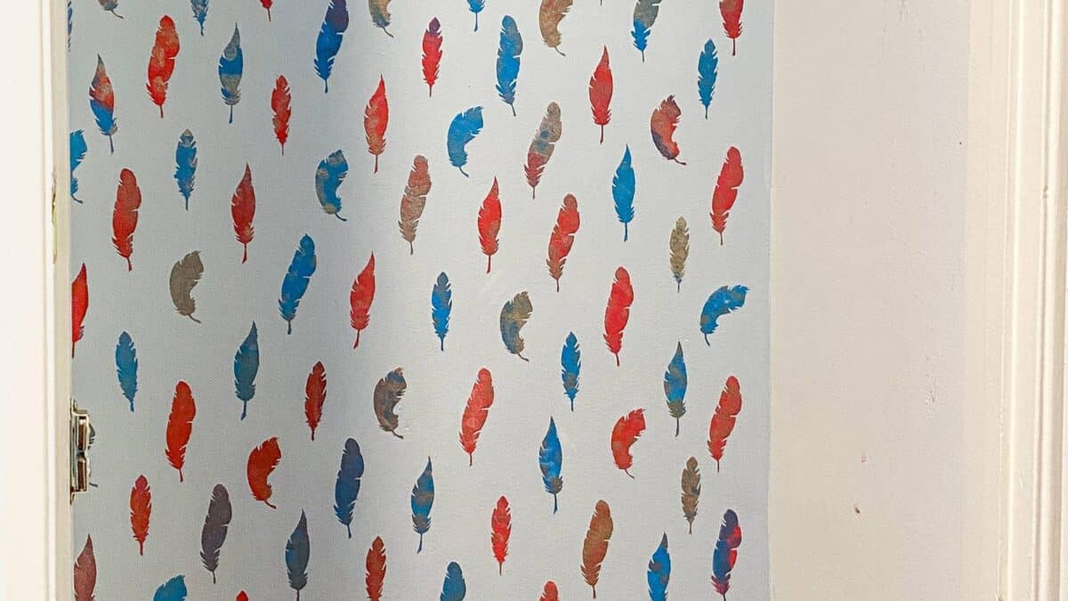 feathers stenciled on wall