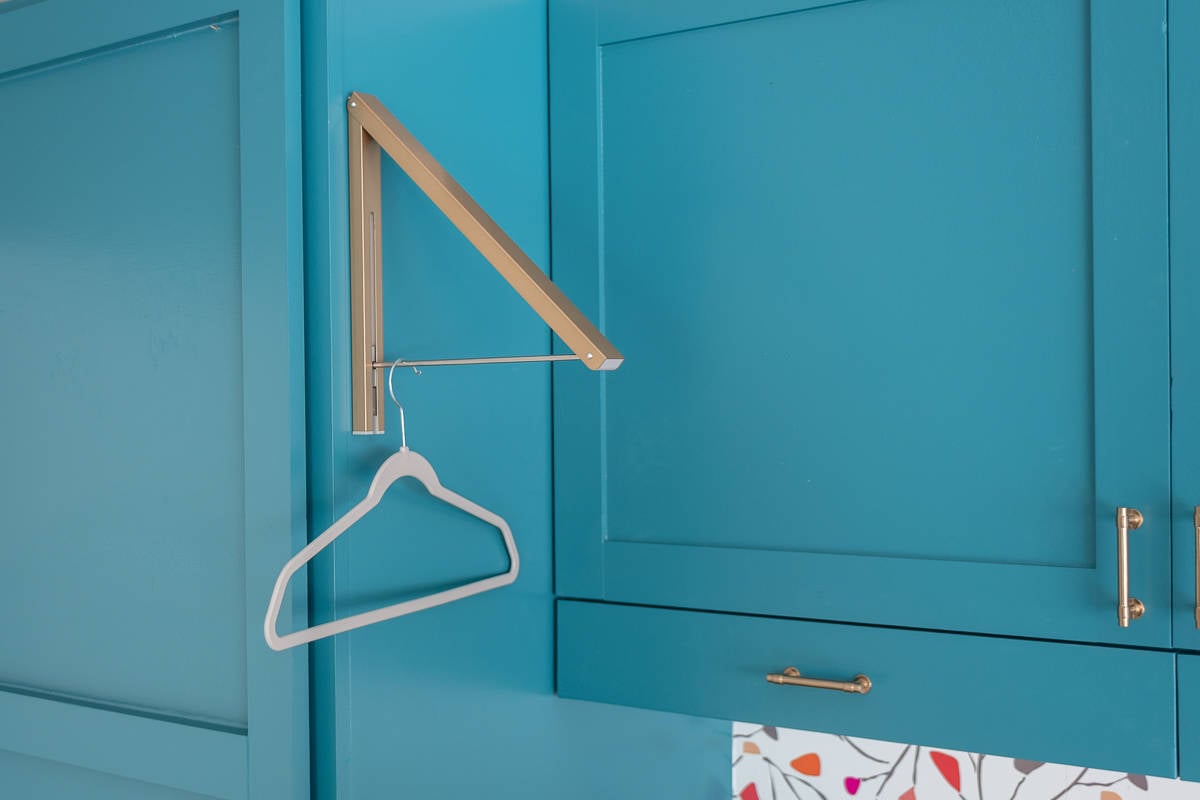 retractable clothes hanger in laundry area