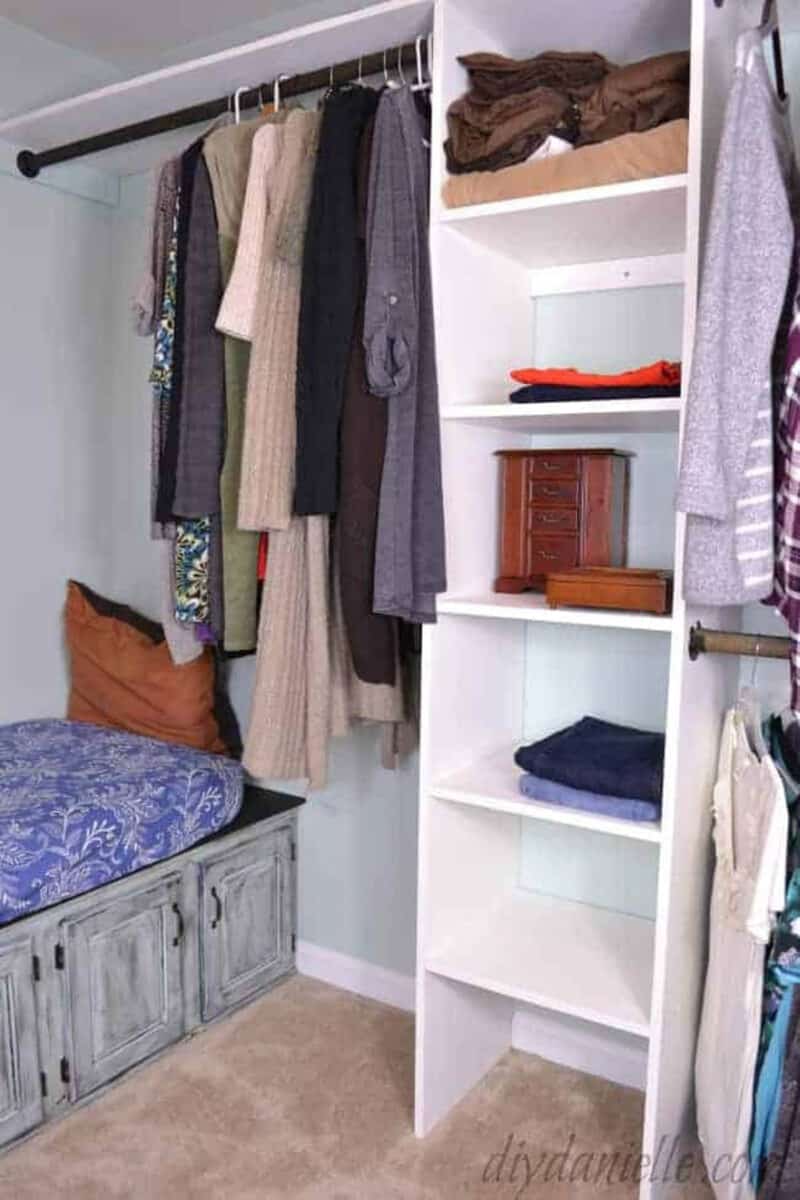 DIY walk-in closet system with bench seating