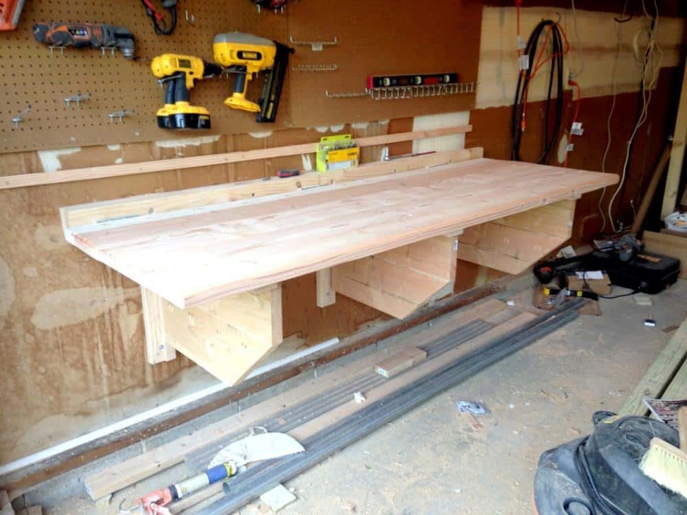 Wall-mounted folding workbench