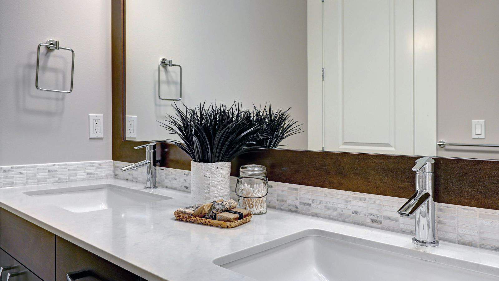 bathroom mirror framed with wood