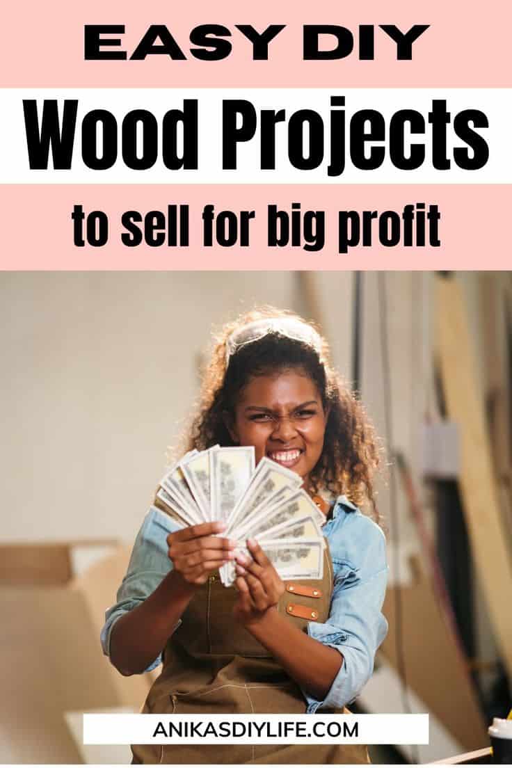 woman holding money made from woodworking projects that sell