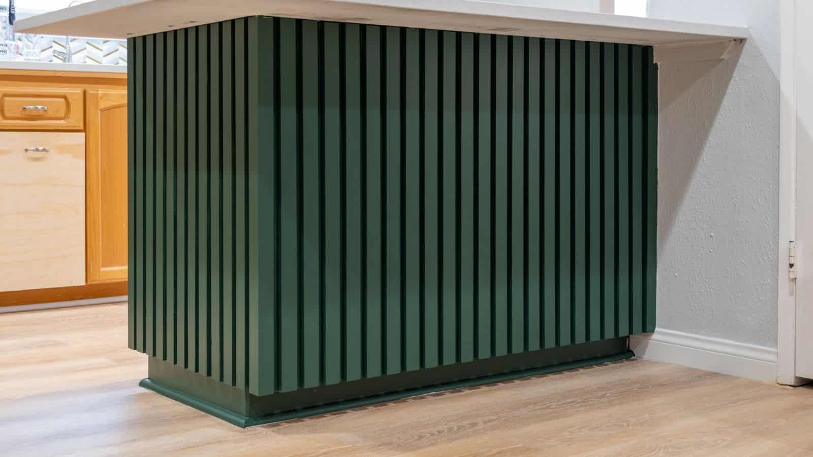 kitchen island makeover with wood slat trim painted green