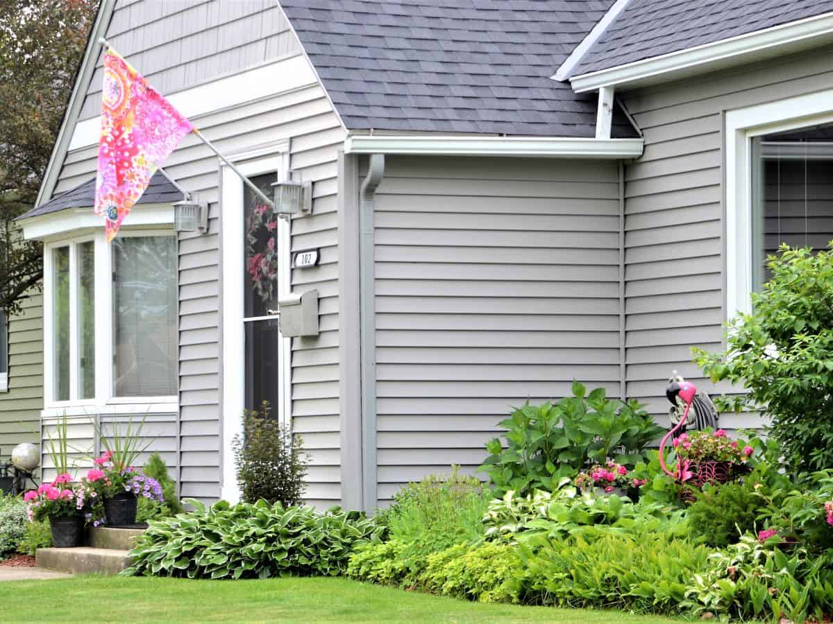 gray house with front yard landscaping
