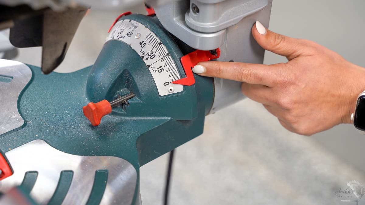 adjusting the bevel gauge pointer on a miter saw