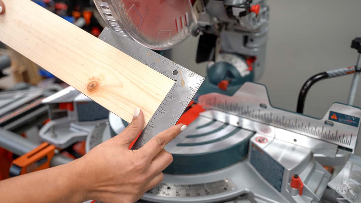 checking the alignment of the saw with a straight cut.