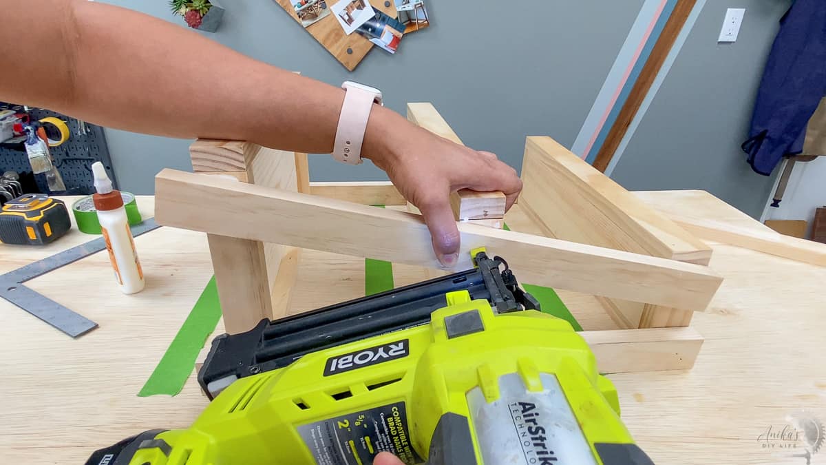Attaching the front leg using finish nails