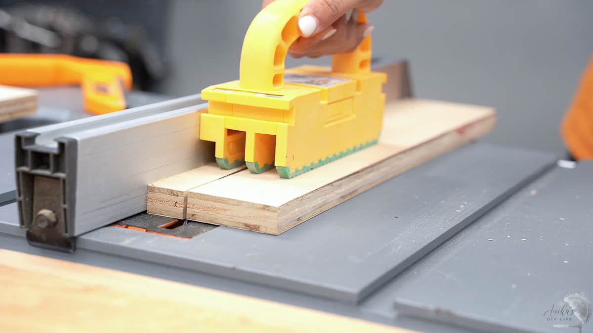 making a narrow rip cut on a table saw using a grr-ripper block