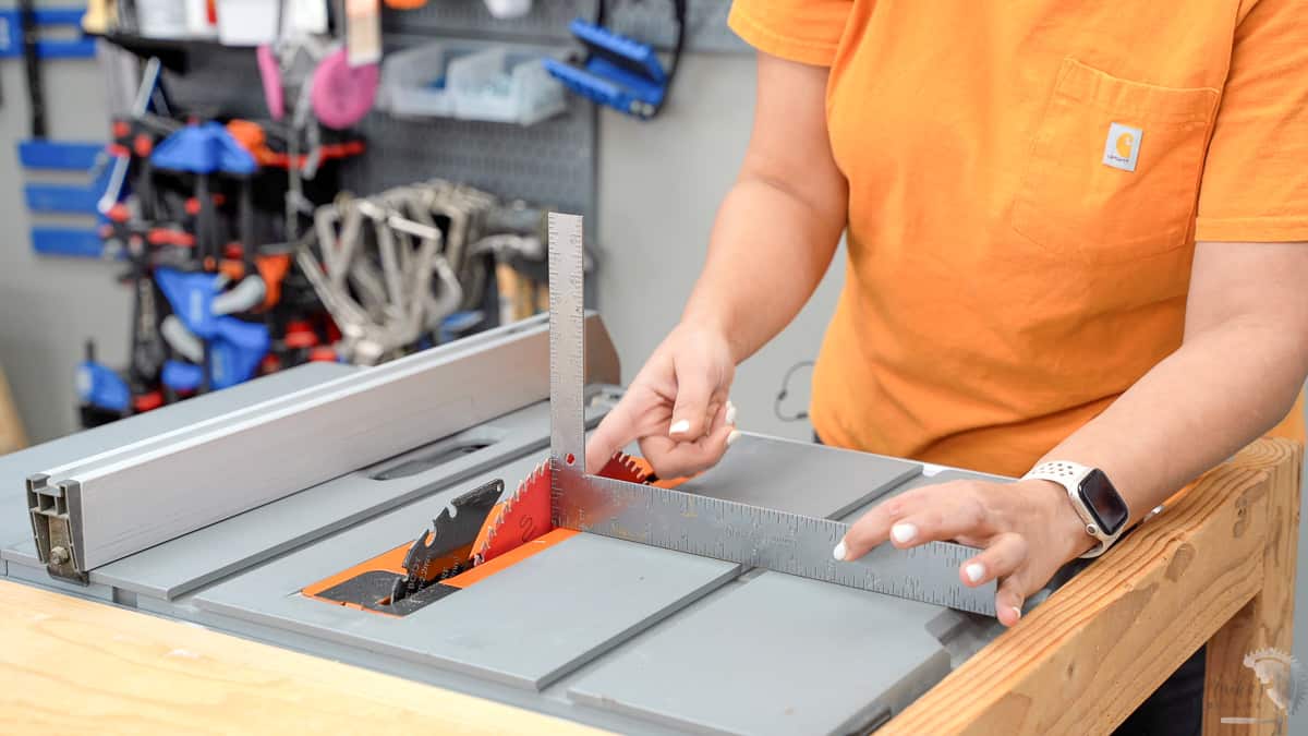 checking if the saw blade is perpendicular to the table