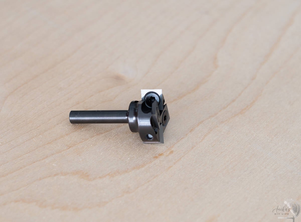 A flattening router bit on plywood.