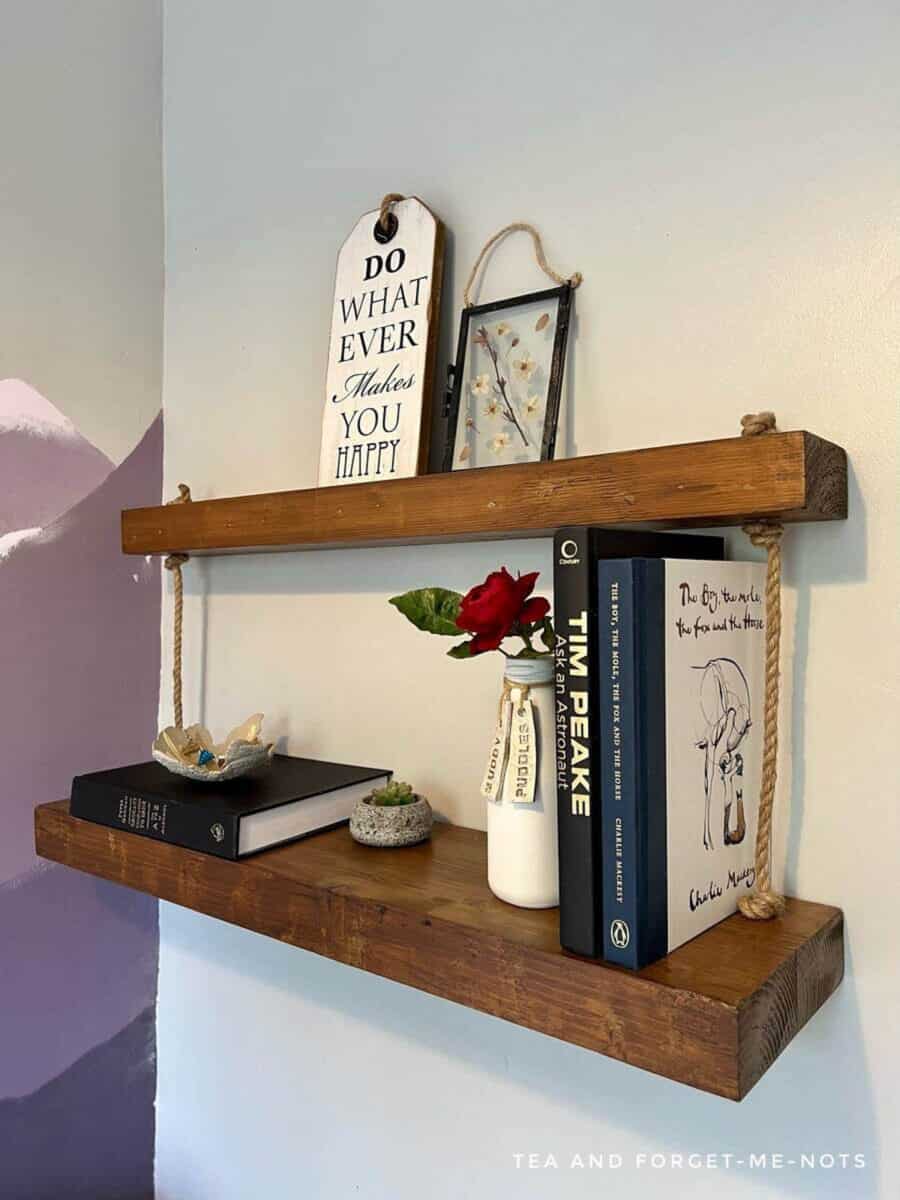 DIY wall shelves with books and decor