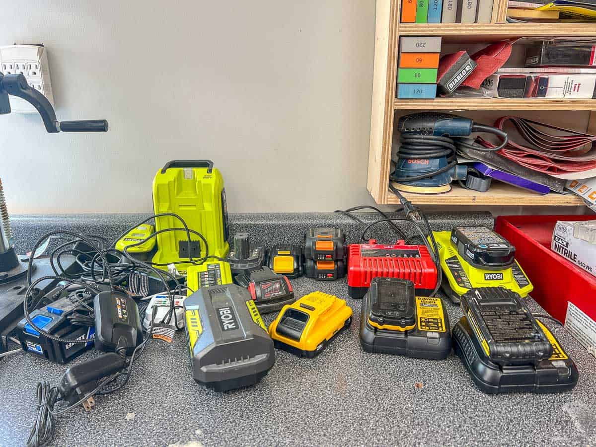 Battery chargers and batteries on a counter in a mess