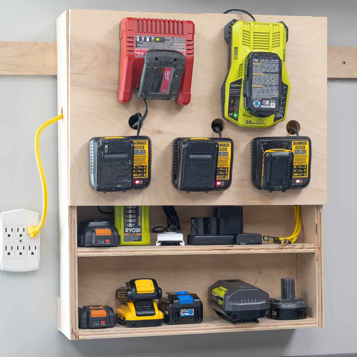 Learn how to build a DIY battery charging station to charge all types of batteries in your workshop, including power tool batteries, camera batteries, and phone chargers.