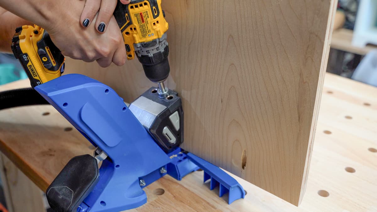 Making pocket holes in the plywood back using a Kreg 720