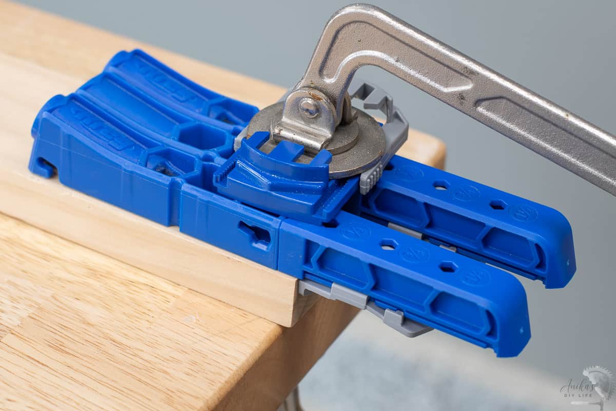 Clamped Kreg 320 on a wood board