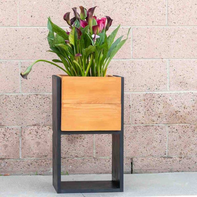 Learn how to build this simple and easy DIY tall modern planter with the step-by-step tutorial, plans, and video.