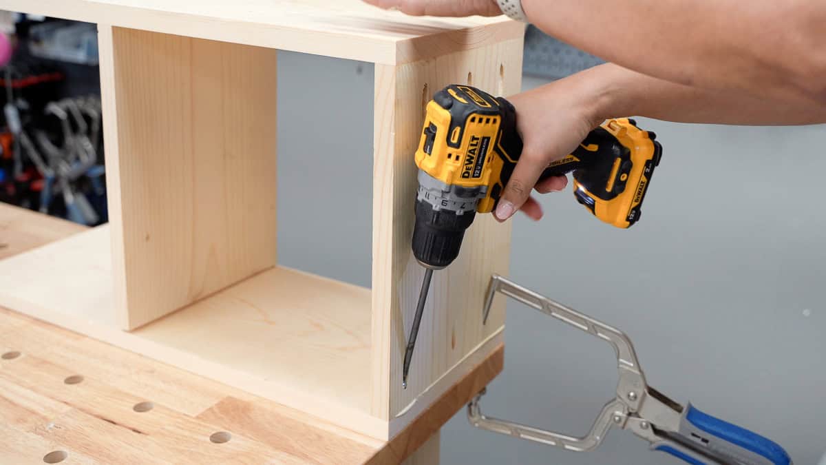 attaching 1x10 boards using pocket holes to make a modern plant stand
