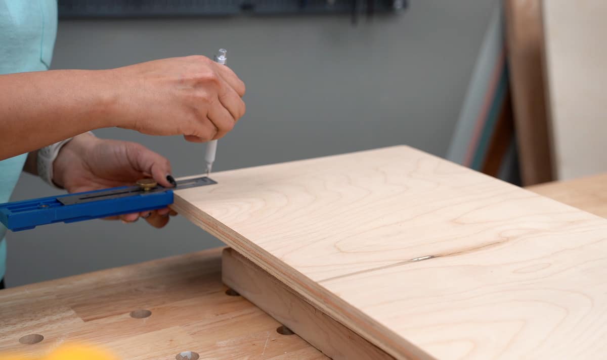 marking plywood to make cut for French cleat using a circular saw