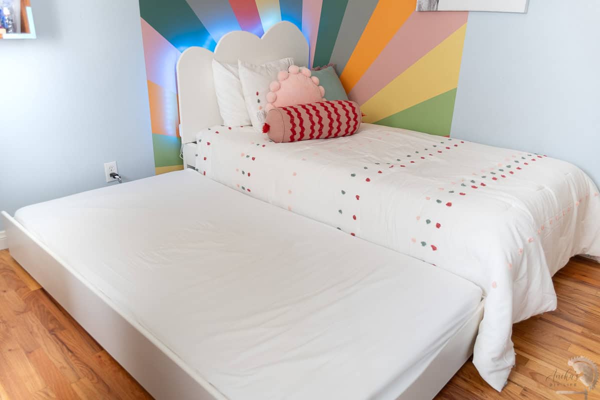 DIY Trundle bed and a twin bed in a colorful room