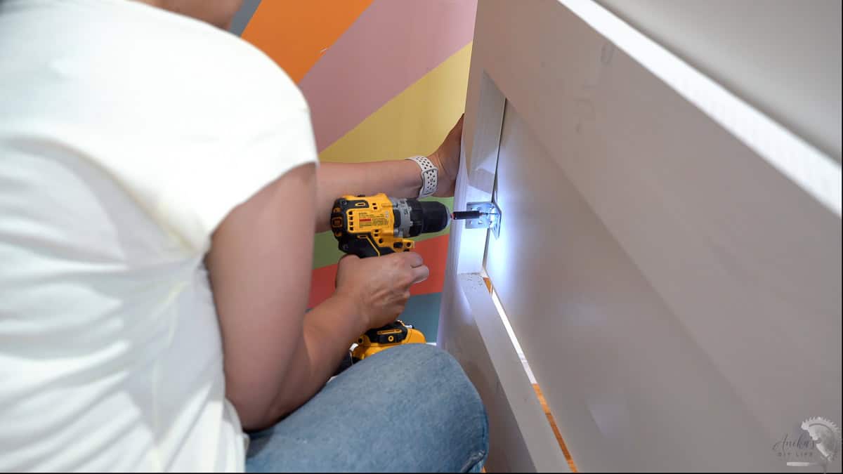attaching the headboard with the corner braces