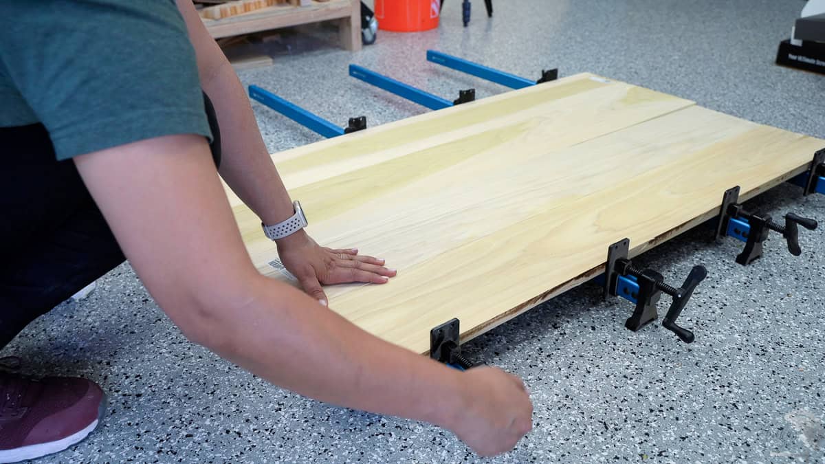 Glueing up poplar boards to make the headboard for the diy twin bed