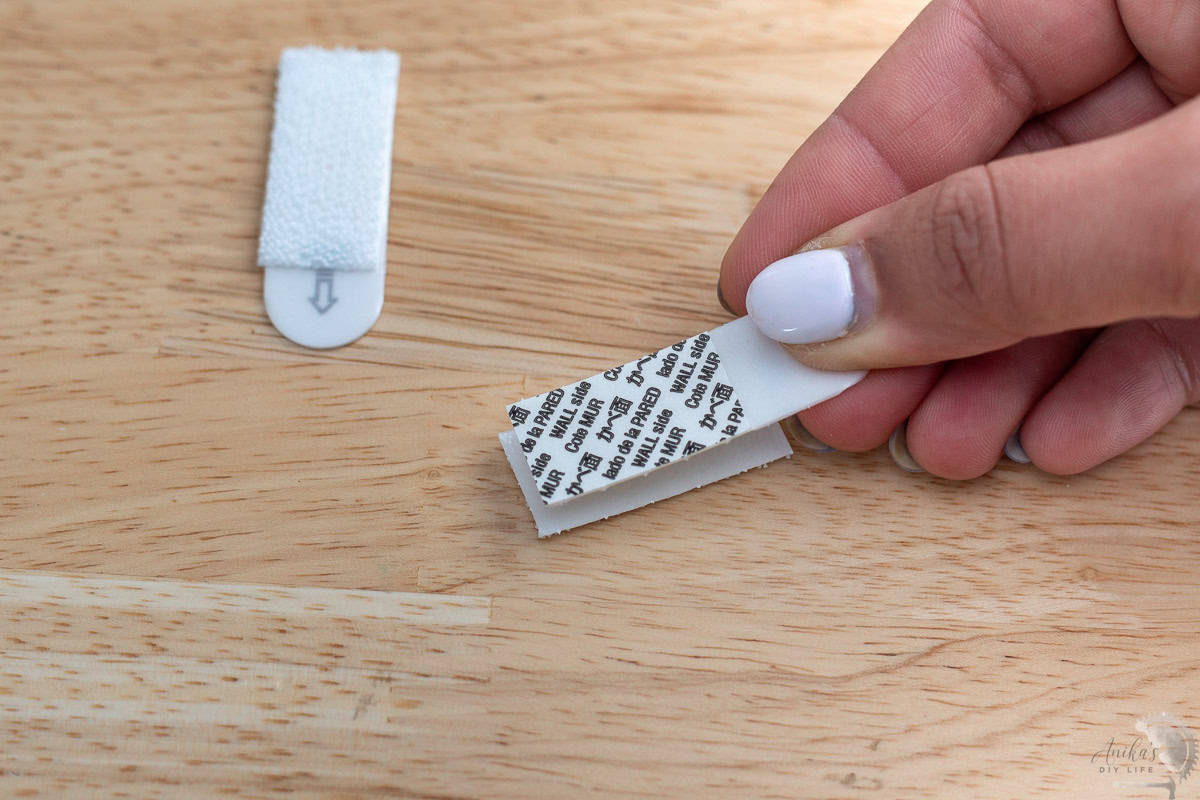 Attaching the 3M adhesive strip to the velcro
