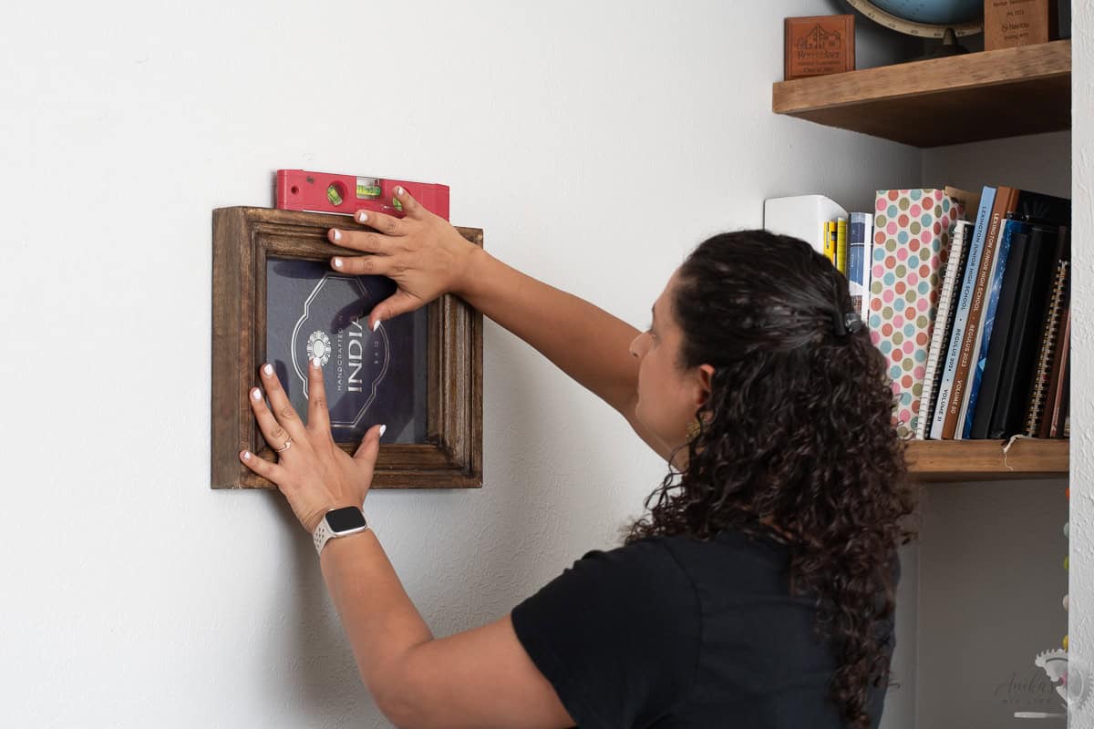 pressing picture to the wall.