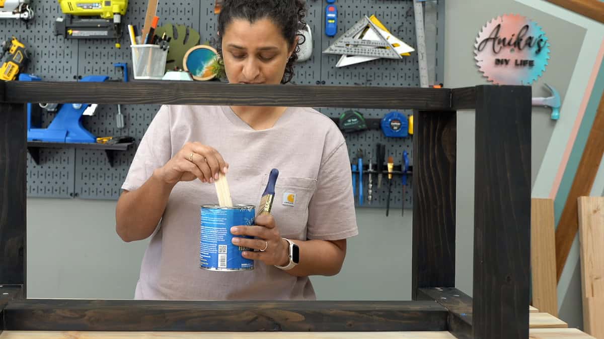 Stirring the top coat before applying