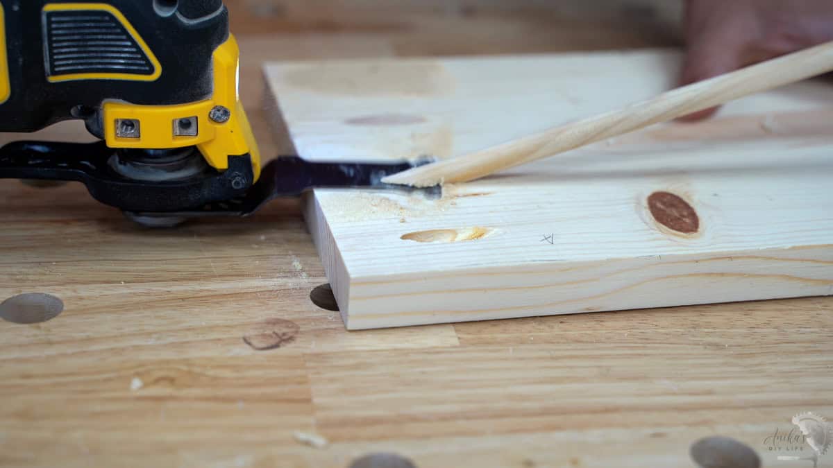 Cutting the dowel off using an oscillating tool
