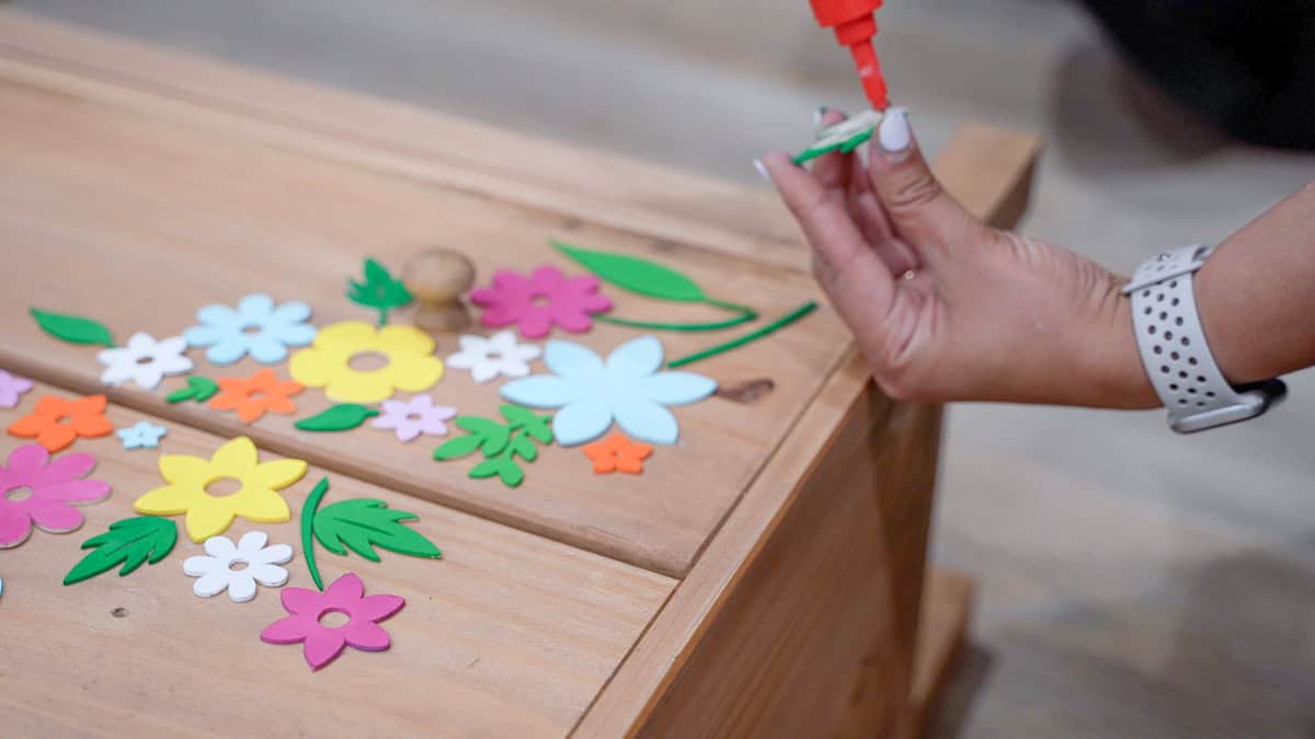 Attaching the cutouts to the dresser
