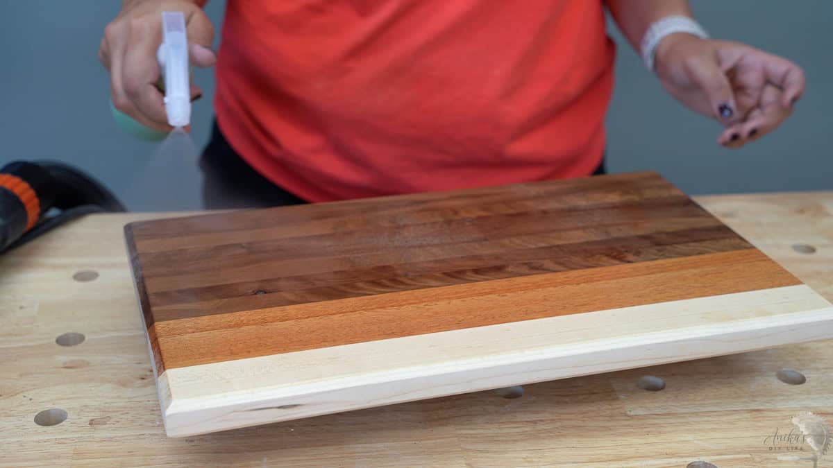 spraying water on the cutting board
