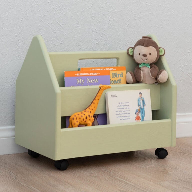 Learn how to build a simple portable DIY Montessori bookshelf perfect for toddlers. It is great to organize books and toys while encouraging their independence.