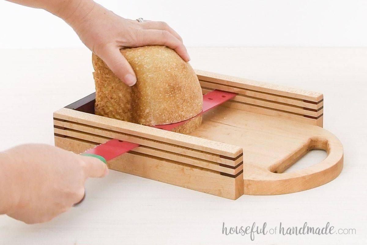 Slicing bread with a DIY bread slicer made from wood